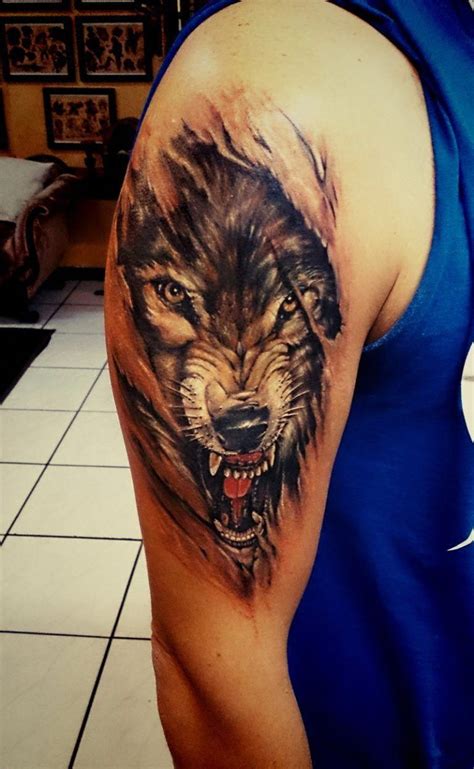 Inner Wolf Upper Arm Men Tattoo Menstattoos Wolf Tattoos Wolf Paw