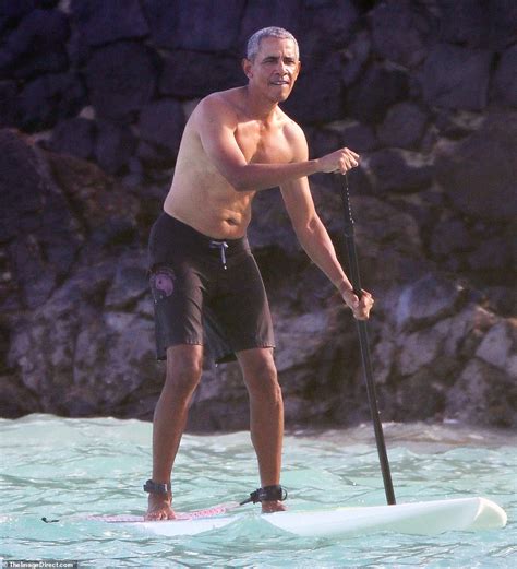 Shirtless Barack Obama Is Pictured Paddleboarding In Hawaii Daily Mail Online