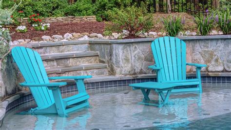 Relaxation In Partially Submerged Chairs On Pool Platform Hgtv