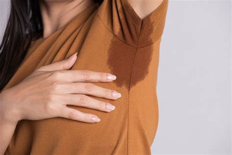 How To Prevent Sweaty Armpit Marks On Your Clothes Huffpost Life