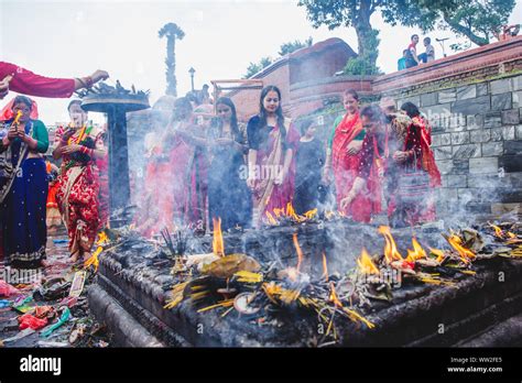 kathmandu nepal sep 2 2019 hindu women offer prayers at the pashupatinath temple during teej