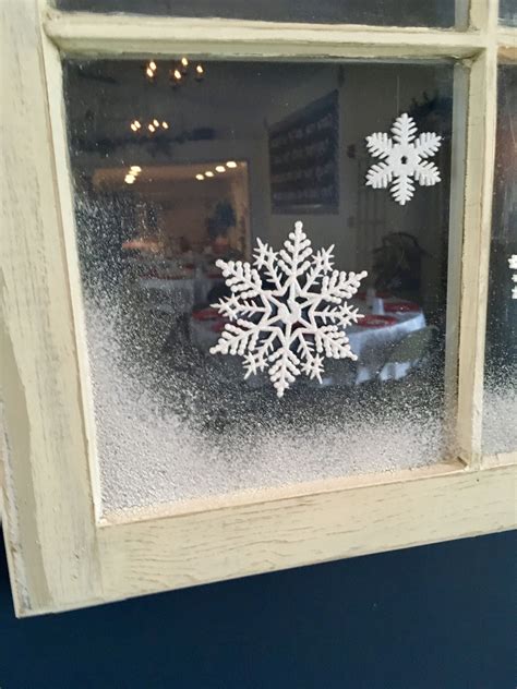 Detail Of Old Window Decorated With Snowflakes And Spray Snow
