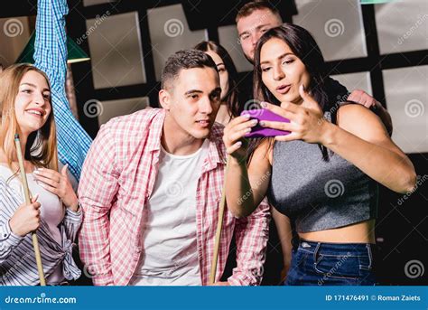 A Group Of Friends Makes A Selfie At The Pool Table Stock Image Image Of Player Nightlife