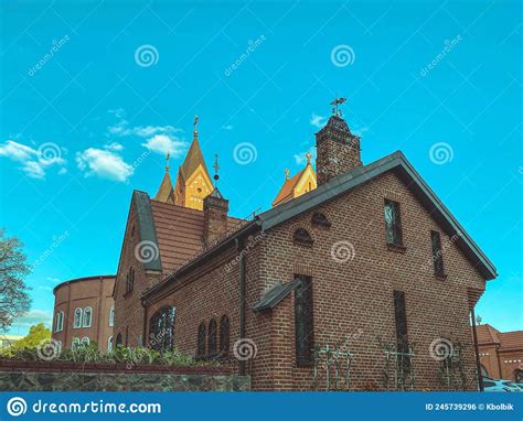 Old Red Brick Church In The City Center Crosses Small Domes Walls