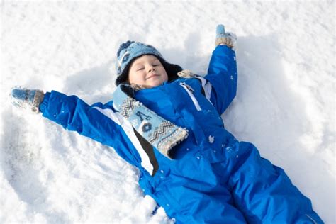 Boy Making Snow Angel Free Stock Photo Public Domain