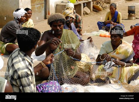Stock Image Of Indian Tribal Fishermen Fishers Repairing Their Fishing