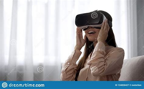Excited Girl Using Vr Headset For First Time Overwhelmed With Positive Emotions Stock Image