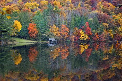 Lake Logan Boathouse In Fall Photograph By Mike Mcglothlen Fine Art