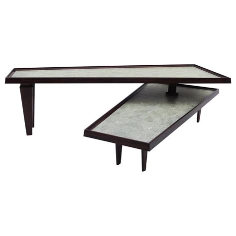 Every living room deserves a stylish coffee table. Modern Coffee Table with Swing Out Level For Sale at 1stdibs
