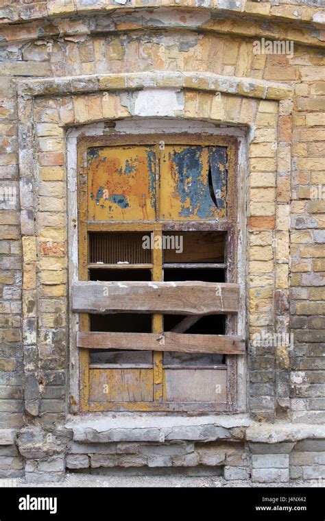 Boarded Up And Brick The Windows On Old Brick Wall Stock Photo Alamy