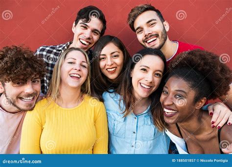 Happy Friends From Different Races And Culture Laughing In Front Of