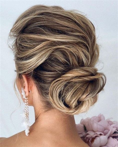 New Updo Hairstyles For Your Trendy Looks In Hair Adviser Hair Updos Long Hair Updo