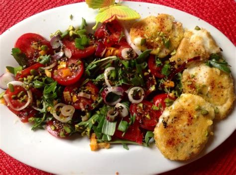 Tomaten- Rucola - Salat mit Salzorangen und gebratenem Mozzarella