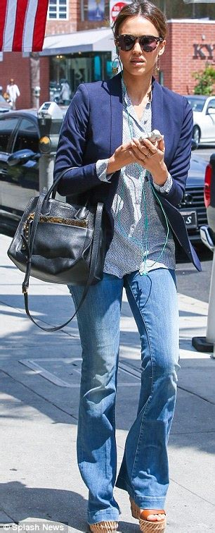 Jessica Alba Pairs Seventies Style Flared Jeans With Chic Blazer