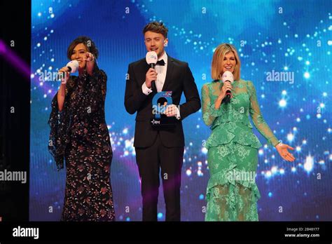 Left To Right Hosts Myleene Klass Roman Kemp And Kate Garraway On Stage During The Global