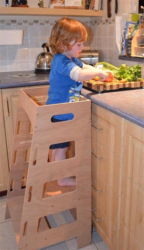 The kitchen helper stool safely and securely elevates toddlers to countertop height. Kitchen Helper Tower - Australian Made Montessori kitchen ...
