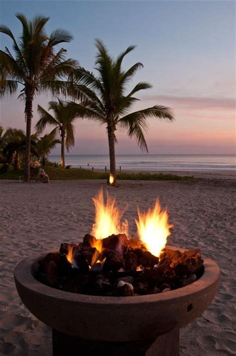 Can you please confirm the status. Fire pit on the #beach. | Cool fire pits, Fire pit, Night ...