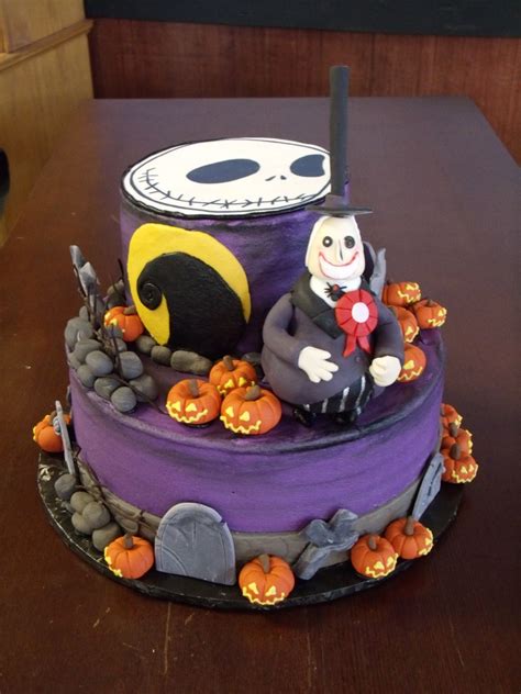 The cake is then coated in white chocolate ganache before the elaborate creation of jack and sally begins. Nightmare before Christmas Halloween Birthday cake ...