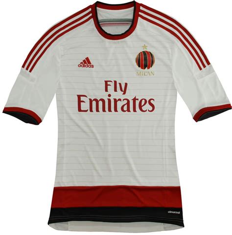 It features a black stripe on the right and red stripe on the left sleeve. Milan 14-15 Home, Away and Third Kits - Footy Headlines