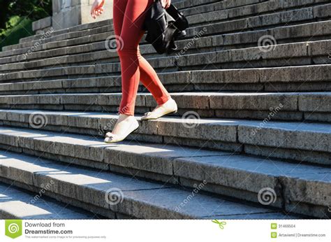 A Woman Walks Down The Stairs Stock Photo Image Of Staircase Travel