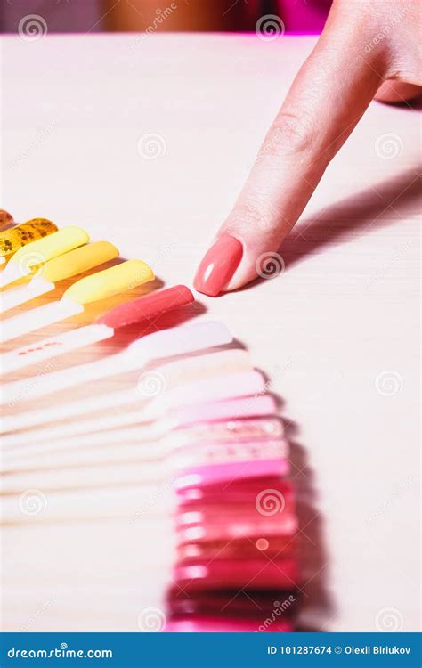 The Choice Of Color Nail Polish In The Beauty Salon Stock Photo Image