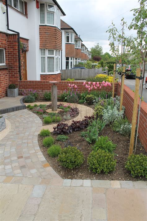 Front Garden With Sweeping Curved Stone Sett Path Crossway Front