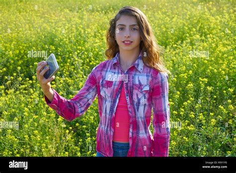 Teen Girl Selfie Video Photo In Spring Meadow Stock Photo Alamy