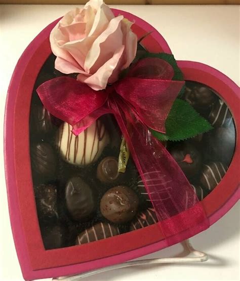 The box consists of a base and a lid. Large Heart-shaped Box with Assorted Chocolates