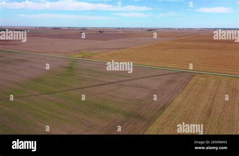 Good Aerial Over Vast Flat Farmland And Fields In Iowa Illinois