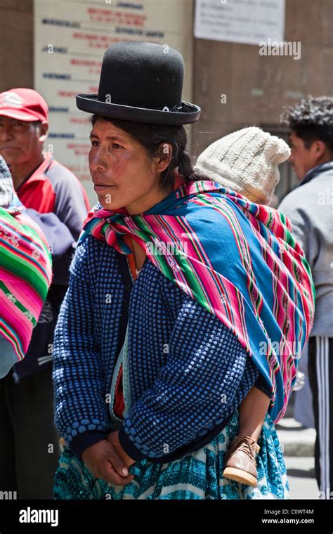 Bolivian Lady In Traditional Dress Carrying Child La Paz Bolivia