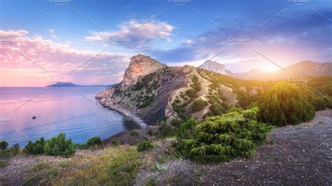 Sunset In Mountains On The Sea Containing Landscape Mountain And Sea