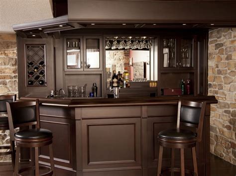 Take your basement bar up a notch and get a hanging wine glass rack from the ceiling. Basement Bar with Granite - Custom Home Bars