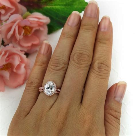 Our collection of antique and vintage engagement rings is simply among the finest, spanning time and styles to bring you your dream ring. 2.25 Ctw, Oval Bridal Set, Vintage Style Engagement Ring, Man Made Diamond Simulants, Art Deco ...