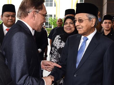 Two top officials from his parti keadilan rakyat (pkr). Anwar Ibrahim walks free after being given royal pardon in ...