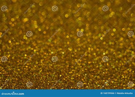 Abstract Christmast Bronze Bokeh Background With Shining Defocus
