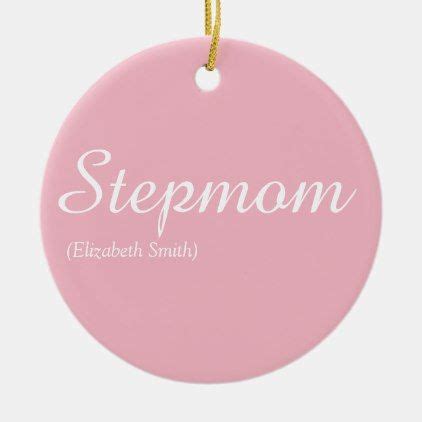 A Pink Ornament With The Name Steemon In White Lettering On It