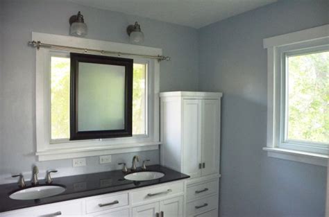 With mirrors, you can add lighting oval bathroom mirrors look perfect and offer a superior reflection in your bathroom. Remodelaholic | Master Bathroom Renovation with Sliding ...