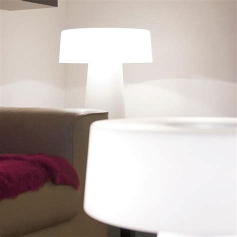 This compact modern table lamp is a beautiful addition to any home, office, or dorm room thanks to its uniquely designed open cage base in metal. Prandina Glam T3 Table Lamp by Luc Ramael | Stardust