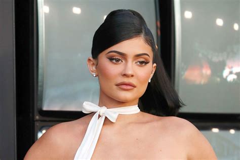 Kylie Jenner Wears An 87 Catsuit From Asos With Pvc Sandals Footwear