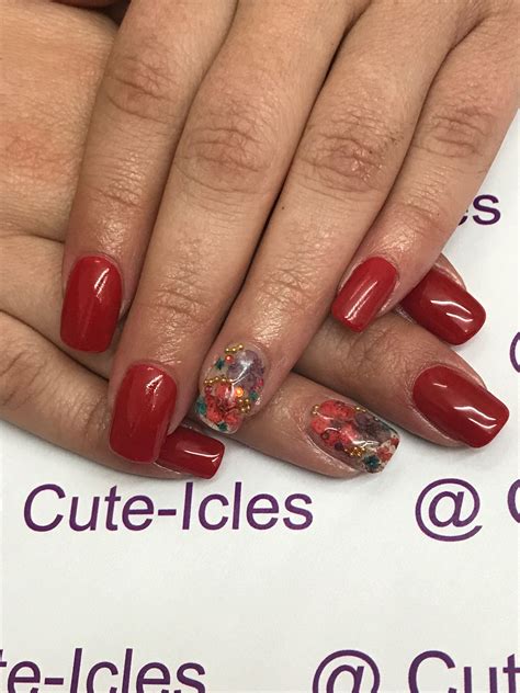Maybe you would like to learn more about one of these? Red nails with dried flowers | Red nails, Nails, Nail care