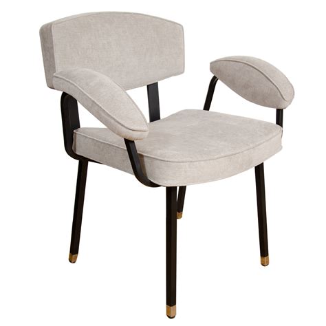 Buy upholstered dining chairs from a wide range of colours. Upholstered dining armchair with black enameled metal ...