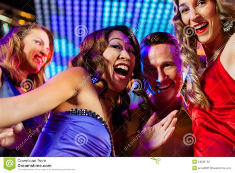 Party People Dancing In Disco Or Club Stock Photo Image Of Adult