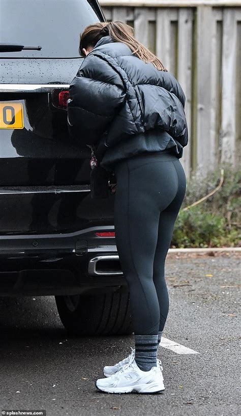 Coleen Rooney Rocks A Sporty Figure In Skin Tight Leggings And Prada Jacket As She Steps Out