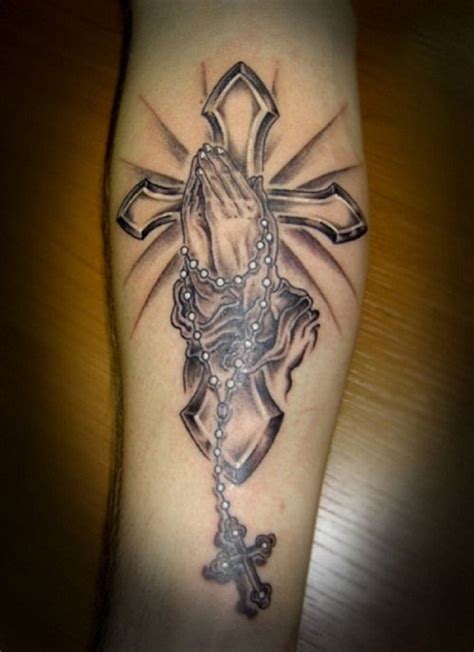 Tattoo of cross on hand. 40+ Best Praying Hands Tattoos On the Internet - Tats 'n ...