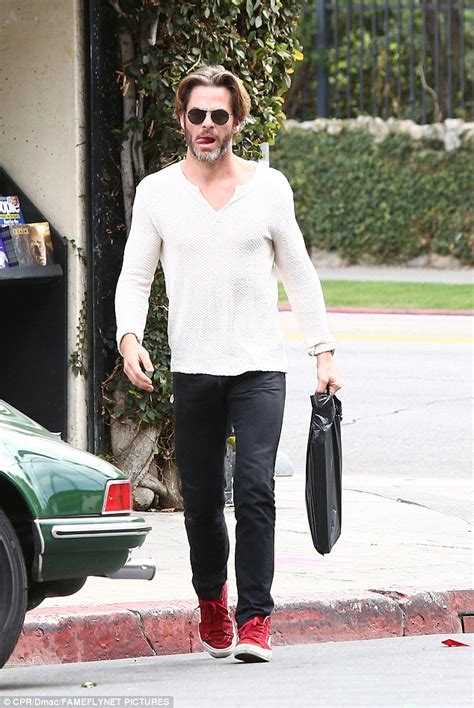 It's the kind of hair that gets him cast as prince charming in blockbuster films and leaves women swooning in his wake, so we were surprised when the star revealed a dramatic haircut yesterday. Chris Pine sports long hair and scruffy grey beard as he ...