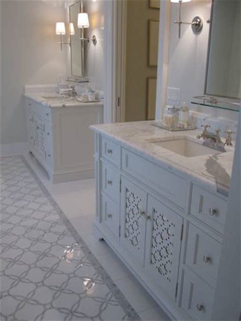 Use mosaic or tile drops. Gray Mosaic Tile - Traditional - bathroom - Phoebe Howard