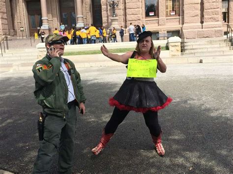 Topless Woman Takes On Open Carry Supporters In Austin