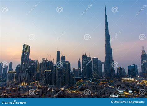 Iconic Panorama At Sunset Of Burj Khalifa And Dubai Skyline As Sun Sets
