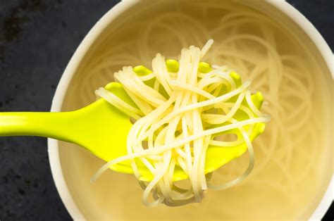 Here's what that hole in the middle of your spaghetti spoon is for ...
