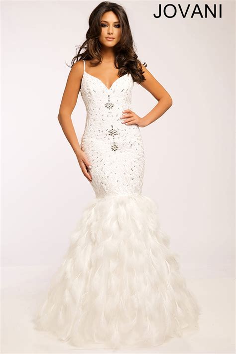 The jovani bridal collection is beyond beautiful. Jovani White Feather Gown | Weddalia